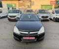 Черный Опель Астра, объемом двигателя 1.4 л и пробегом 170 тыс. км за 4900 $, фото 2 на Automoto.ua