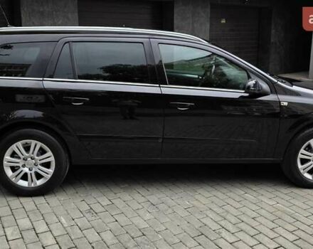 Черный Опель Астра, объемом двигателя 1.7 л и пробегом 224 тыс. км за 5650 $, фото 11 на Automoto.ua