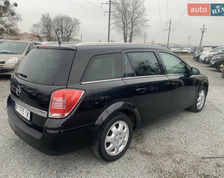 Черный Опель Астра, объемом двигателя 1.6 л и пробегом 232 тыс. км за 5500 $, фото 6 на Automoto.ua