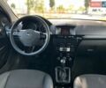 Чорний Опель Астра, об'ємом двигуна 1.4 л та пробігом 179 тис. км за 5800 $, фото 29 на Automoto.ua