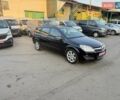 Черный Опель Астра, объемом двигателя 1.4 л и пробегом 170 тыс. км за 4900 $, фото 4 на Automoto.ua