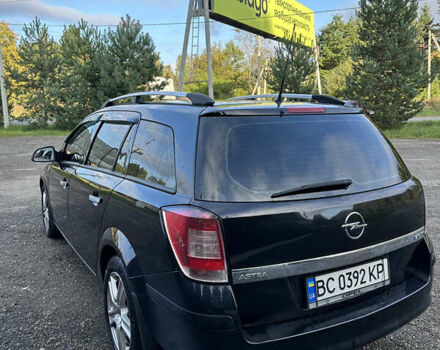 Чорний Опель Астра, об'ємом двигуна 1.69 л та пробігом 240 тис. км за 5300 $, фото 4 на Automoto.ua