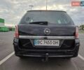 Черный Опель Астра, объемом двигателя 1.6 л и пробегом 212 тыс. км за 5200 $, фото 9 на Automoto.ua