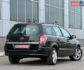 Черный Опель Астра, объемом двигателя 1.6 л и пробегом 187 тыс. км за 5500 $, фото 30 на Automoto.ua