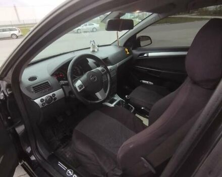 Черный Опель Астра, объемом двигателя 1.25 л и пробегом 325 тыс. км за 4699 $, фото 3 на Automoto.ua