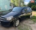 Черный Опель Астра, объемом двигателя 1.36 л и пробегом 285 тыс. км за 4600 $, фото 2 на Automoto.ua