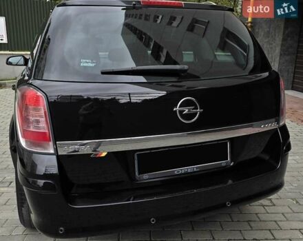 Черный Опель Астра, объемом двигателя 1.7 л и пробегом 224 тыс. км за 5650 $, фото 7 на Automoto.ua
