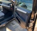 Черный Опель Астра, объемом двигателя 1.7 л и пробегом 250 тыс. км за 5250 $, фото 5 на Automoto.ua