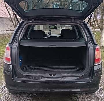 Черный Опель Астра, объемом двигателя 1.6 л и пробегом 216 тыс. км за 5500 $, фото 9 на Automoto.ua