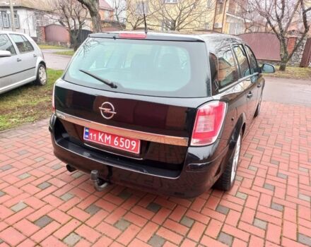 Черный Опель Астра, объемом двигателя 1.8 л и пробегом 200 тыс. км за 5750 $, фото 5 на Automoto.ua
