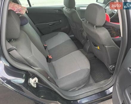 Черный Опель Астра, объемом двигателя 1.6 л и пробегом 212 тыс. км за 5200 $, фото 24 на Automoto.ua