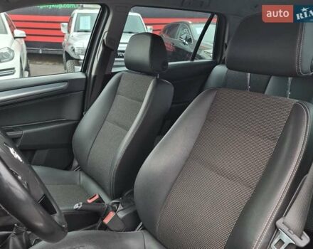 Черный Опель Астра, объемом двигателя 1.6 л и пробегом 247 тыс. км за 6299 $, фото 44 на Automoto.ua