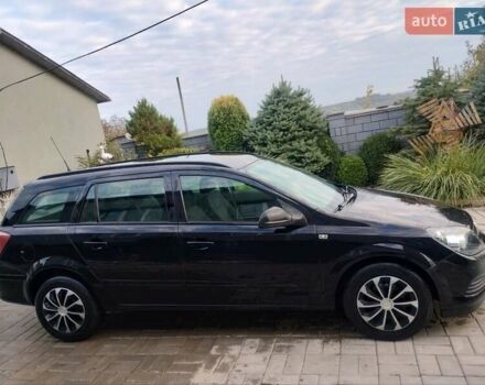 Черный Опель Астра, объемом двигателя 1.69 л и пробегом 308 тыс. км за 4500 $, фото 3 на Automoto.ua