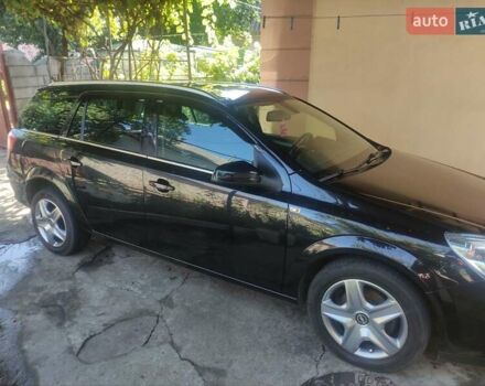 Черный Опель Астра, объемом двигателя 1.6 л и пробегом 205 тыс. км за 5700 $, фото 7 на Automoto.ua