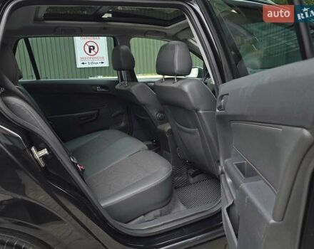 Черный Опель Астра, объемом двигателя 1.7 л и пробегом 224 тыс. км за 5599 $, фото 30 на Automoto.ua