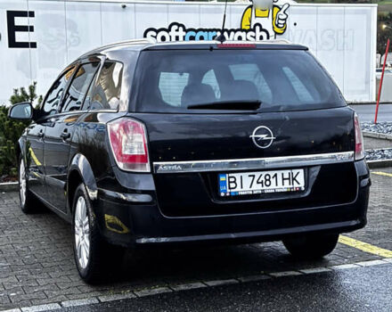 Черный Опель Астра, объемом двигателя 1.69 л и пробегом 268 тыс. км за 8000 $, фото 4 на Automoto.ua
