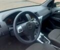Черный Опель Астра, объемом двигателя 1.4 л и пробегом 214 тыс. км за 4950 $, фото 5 на Automoto.ua