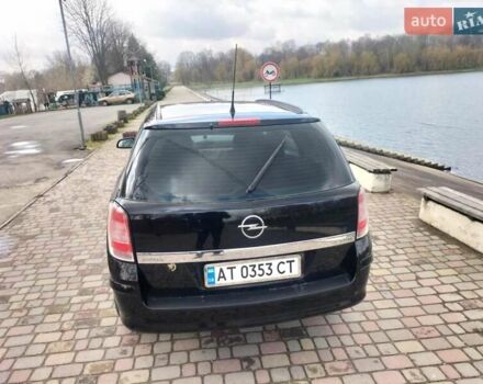 Черный Опель Астра, объемом двигателя 1.7 л и пробегом 249 тыс. км за 5300 $, фото 4 на Automoto.ua