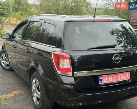 Черный Опель Астра, объемом двигателя 1.6 л и пробегом 210 тыс. км за 6400 $, фото 3 на Automoto.ua