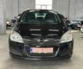Черный Опель Астра, объемом двигателя 1.6 л и пробегом 186 тыс. км за 6799 $, фото 1 на Automoto.ua