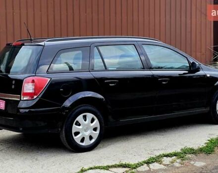 Черный Опель Астра, объемом двигателя 1.6 л и пробегом 238 тыс. км за 6299 $, фото 18 на Automoto.ua