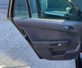 Черный Опель Астра, объемом двигателя 1.7 л и пробегом 250 тыс. км за 5250 $, фото 3 на Automoto.ua
