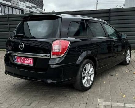 Черный Опель Астра, объемом двигателя 1.6 л и пробегом 152 тыс. км за 7200 $, фото 21 на Automoto.ua