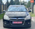 Черный Опель Астра, объемом двигателя 1.6 л и пробегом 195 тыс. км за 6700 $, фото 1 на Automoto.ua