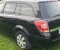 Черный Опель Астра, объемом двигателя 1.4 л и пробегом 150 тыс. км за 6100 $, фото 3 на Automoto.ua