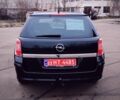 Черный Опель Астра, объемом двигателя 1.6 л и пробегом 172 тыс. км за 5350 $, фото 6 на Automoto.ua