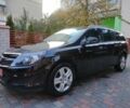 Черный Опель Астра, объемом двигателя 1.4 л и пробегом 215 тыс. км за 5900 $, фото 2 на Automoto.ua
