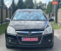 Черный Опель Астра, объемом двигателя 1.6 л и пробегом 195 тыс. км за 5900 $, фото 4 на Automoto.ua