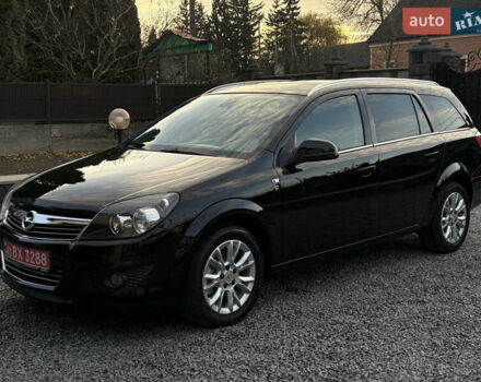 Черный Опель Астра, объемом двигателя 1.6 л и пробегом 252 тыс. км за 6400 $, фото 1 на Automoto.ua