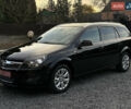 Черный Опель Астра, объемом двигателя 1.6 л и пробегом 252 тыс. км за 6400 $, фото 1 на Automoto.ua