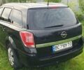 Черный Опель Астра, объемом двигателя 1.4 л и пробегом 150 тыс. км за 6100 $, фото 1 на Automoto.ua