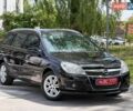 Черный Опель Астра, объемом двигателя 1.6 л и пробегом 166 тыс. км за 6450 $, фото 1 на Automoto.ua