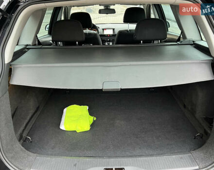 Черный Опель Астра, объемом двигателя 1.7 л и пробегом 264 тыс. км за 5799 $, фото 49 на Automoto.ua