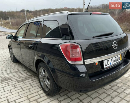 Черный Опель Астра, объемом двигателя 1.7 л и пробегом 264 тыс. км за 5799 $, фото 17 на Automoto.ua