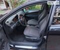 Черный Опель Астра, объемом двигателя 1.91 л и пробегом 330 тыс. км за 7000 $, фото 11 на Automoto.ua