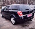 Черный Опель Астра, объемом двигателя 1.6 л и пробегом 237 тыс. км за 5350 $, фото 7 на Automoto.ua