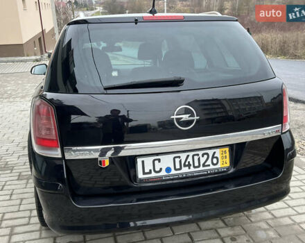 Черный Опель Астра, объемом двигателя 1.7 л и пробегом 264 тыс. км за 5799 $, фото 21 на Automoto.ua