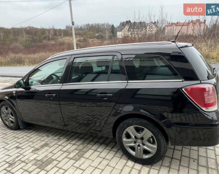 Черный Опель Астра, объемом двигателя 1.7 л и пробегом 264 тыс. км за 5799 $, фото 16 на Automoto.ua