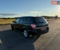 Черный Опель Астра, объемом двигателя 1.6 л и пробегом 175 тыс. км за 6300 $, фото 3 на Automoto.ua