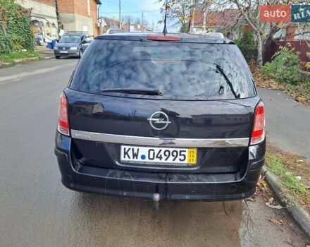 Черный Опель Астра, объемом двигателя 1.6 л и пробегом 209 тыс. км за 5100 $, фото 3 на Automoto.ua