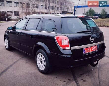 Черный Опель Астра, объемом двигателя 1.6 л и пробегом 172 тыс. км за 5350 $, фото 7 на Automoto.ua