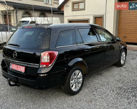 Черный Опель Астра, объемом двигателя 1.6 л и пробегом 252 тыс. км за 6400 $, фото 13 на Automoto.ua