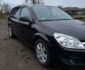 Черный Опель Астра, объемом двигателя 1.6 л и пробегом 216 тыс. км за 6200 $, фото 1 на Automoto.ua