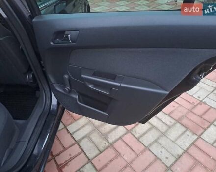Черный Опель Астра, объемом двигателя 1.6 л и пробегом 209 тыс. км за 5800 $, фото 21 на Automoto.ua