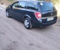 Черный Опель Астра, объемом двигателя 1.6 л и пробегом 252 тыс. км за 5250 $, фото 1 на Automoto.ua