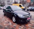 Черный Опель Астра, объемом двигателя 1.6 л и пробегом 212 тыс. км за 5750 $, фото 4 на Automoto.ua